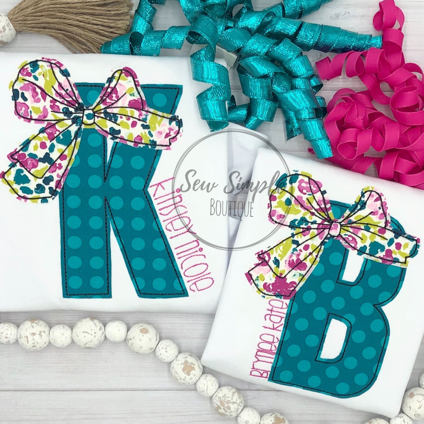 BIG BOW INITIAL