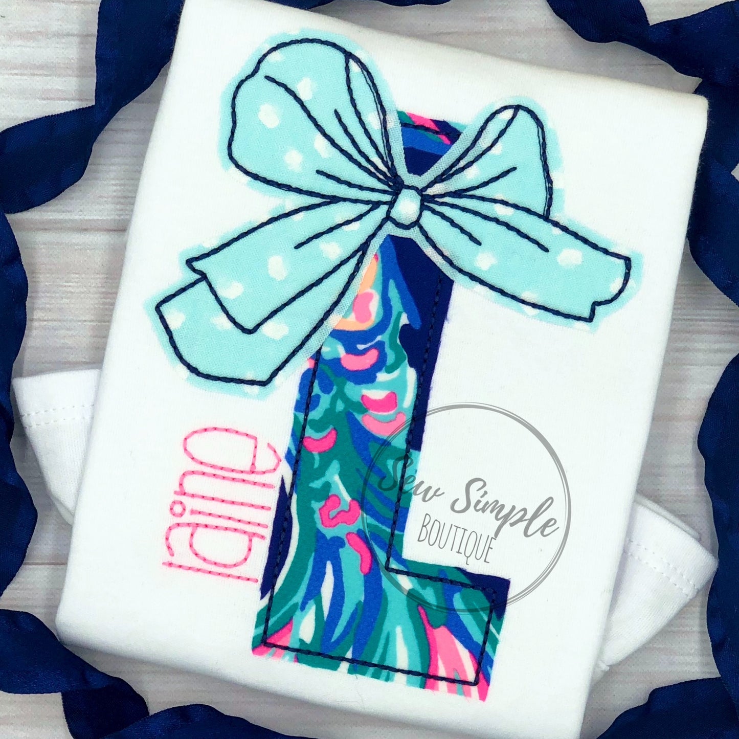 BIG BOW INITIAL